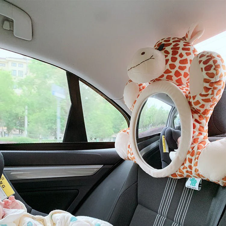 Car Safety Seat Rearview Mirror for Baby – Baby Monitor Toy with Plush Deer Design. Features a plush deer design and doubles as a baby monitor toy.